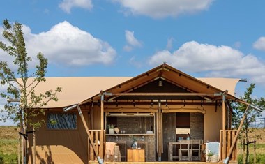 Luxe safaritent met buiten bar Luxe safaritent met buiten bar